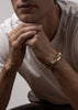 Gold plated ribbed cuff accessory by Skultuna, featuring a textured design with ribbed detailing.