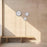 Arne Jacobsen Station wall clock hanging on a wall, minimalist design, round face with clean lines and modern style.