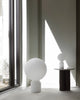 White Yo Table Lamp by Normann Copenhagen, large and small sizes, modern lighting with sleek design and warm illumination.