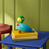 Kay Bojesen Story Bird accessory featuring a wooden bird figure with a playful design and natural wood finish.