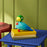 Kay Bojesen Story Bird accessory featuring a wooden bird figure with a playful design and natural wood finish.