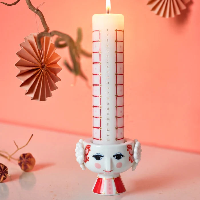 Red Eva Christmas candle holder by Bjørn Wiinblad, decorative accessory with intricate design, measures 3.1 inches tall.