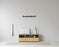 Rib Sideboard Low Hybrid by Normann Copenhagen featuring oak finish, black storage compartments, and a minimalist design.