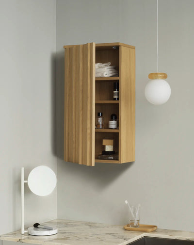 Rib Wall Cabinet by Normann Copenhagen for modern storage, shown in Hinx Lamp Sand color with sleek design.