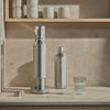 Stelton Brus Carbonator accessory for soda making, featuring sleek stainless steel design and ergonomic handle.