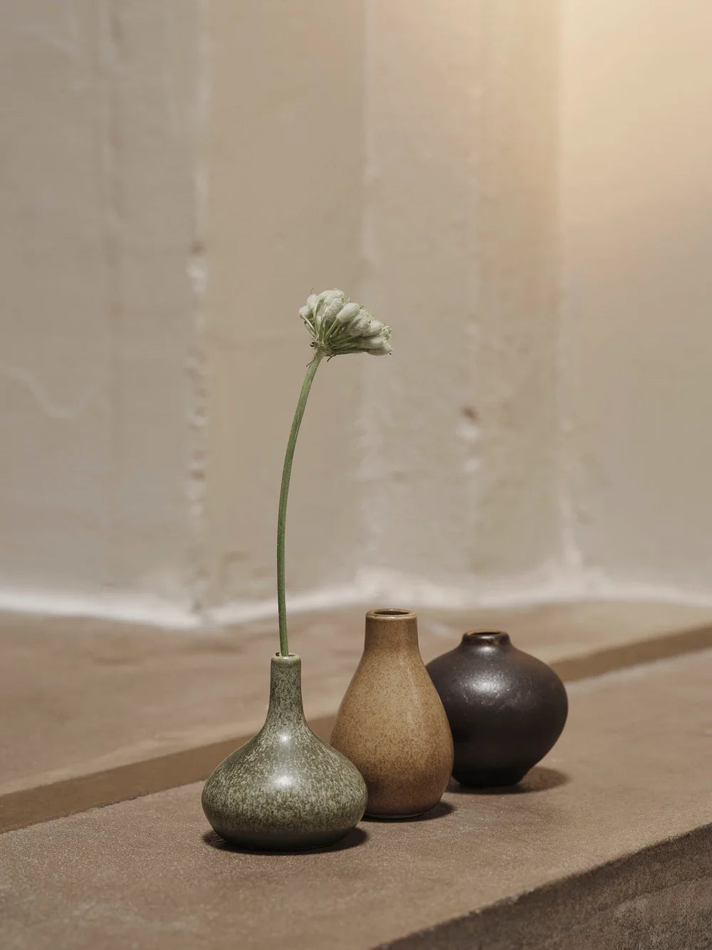 Ferm Living Komo Mini Vases set of small ceramic accessories in neutral tones with simple geometric design.
