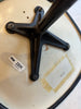 Vintage Charles Eames PSCC Herman Miller rolling task chair with black seat and chrome base, ergonomic seating design.