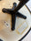 Vintage Charles Eames PSCC Herman Miller rolling task chair with black seat and chrome base, ergonomic seating design.