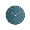 City Hall Wall Clock by Arne Jacobsen, modern minimalist clock with sleek design and clean lines, mounted on a neutral wall.