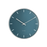 City Hall Wall Clock by Arne Jacobsen, modern minimalist clock with sleek design and clean lines, mounted on a neutral wall.