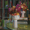 Eva Vase by Bjørn Wiinblad, decorative ceramic accessories with colorful floral design, shown in a close-up view.
