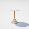 30-inch tan Bistro Table by Bend Goods with a round metal top and sleek modern design, perfect for small dining or outdoor spaces.