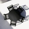 Round Bend Goods pedestal cafe table with sleek metal base and wooden top, ideal for modern dining or café settings.