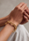 Gold plated Relier Petit bracelet by Skultuna featuring delicate chain and minimalist design, perfect as a stylish accessories piece.