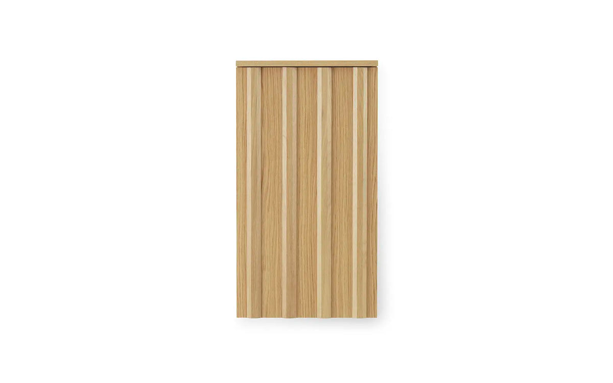 Rib Wall Cabinet by Normann Copenhagen in oak wood, modern storage unit with ribbed design for wall mounting.