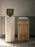 Ferm Living Burl Side Table with rounded edges and natural wood finish, designed for modern living spaces.