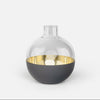 Skultuna Pomme accessories with sleek, modern design, featuring smooth metallic surfaces and elegant craftsmanship.