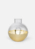 Skultuna Pomme accessories with sleek metallic design, featuring elegant shapes and polished surfaces, suitable for modern home decor.