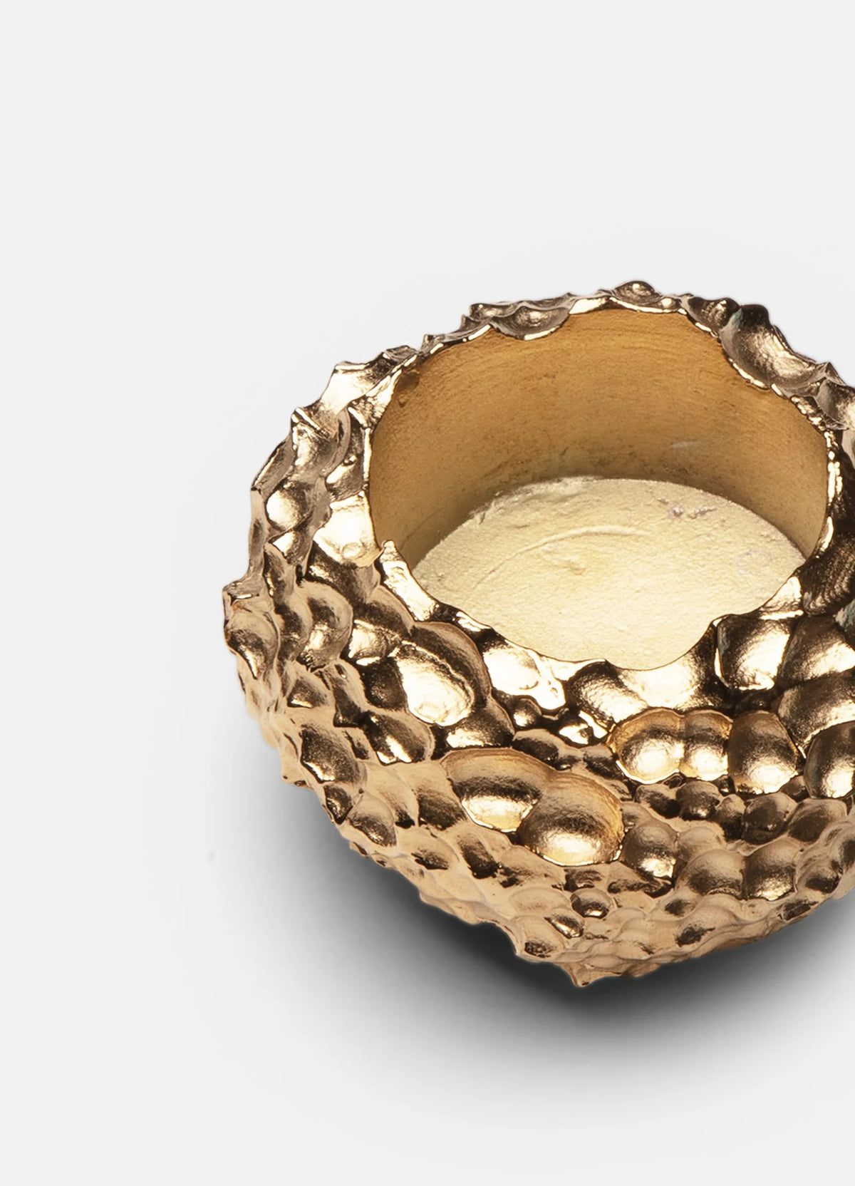 Opaque tealight holder from Skultuna, sleek accessories with a modern design, shown in a close-up image.