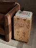 Burl side table by Ferm Living featuring a sleek wooden surface and modern design, perfect for living room or bedroom decor.