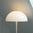 Louis Poulsen Panthella Floor Lamp with white curved shade and slim base, modern lighting fixture for stylish interior illumination