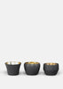 Skultuna Kin accessories in elegant metal design, featuring modern geometric shapes and a sleek finish.
