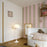 Louis Poulsen Panthella Floor lamp with white dome-shaped shade and slender stand, designed for stylish indoor lighting.