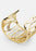 Skultuna Dew Cuff accessory featuring a sleek, modern design with a polished metal finish and intricate detailing.