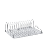 Ferm Living Curvature Dish Rack holding clean dishes and utensils, modern black metal design on a kitchen countertop.