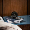 City Hall Table Clock by Arne Jacobsen, minimalist accessories with a sleek design and clean lines, showcasing a modern timepiece.