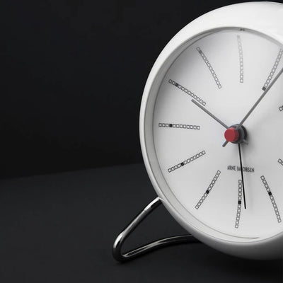 Arne Jacobsen Bankers Table Clock in black with sleek modern design, accessory for desk or tabletop decor.