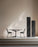 Pastoe SM05 Wire Dining Chair with sleek metal frame and wooden seat, modern seating design displayed in a stylish setting.
