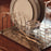 Ferm Living Curvature Dish Rack, modern black metal kitchen organizer with curved design and multiple slots for dishes and utensils.