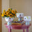 Eva Flowerpot by Bjørn Wiinblad, decorative ceramic accessory with intricate floral design in vibrant colors.