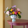 Eva Flowerpot by Bjørn Wiinblad, decorative ceramic accessory with vibrant floral design, showcasing artistic craftsmanship.
