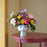 Eva Flowerpot by Bjørn Wiinblad, decorative ceramic accessory with vibrant floral design, showcasing artistic craftsmanship.