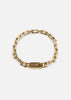 Gold-plated Relier Nano bracelet by Skultuna, featuring a sleek, minimalist design with delicate chain and small charm.