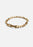 Gold plated Relier Nano bracelet by Skultuna, showcasing delicate chain and minimalist design as worn on the wrist.