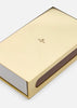 Skultuna Matchbox accessory with the Skultuna logo, featuring a sleek, minimalist design in metal with a textured finish.