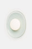 Rich Brilliant Willing Crepe Sconce lighting fixture with a sleek, textured design mounted on a wall.