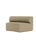 Audo Copenhagen Eave Seamline Modular sofa with a concave seating module in a modern living space.