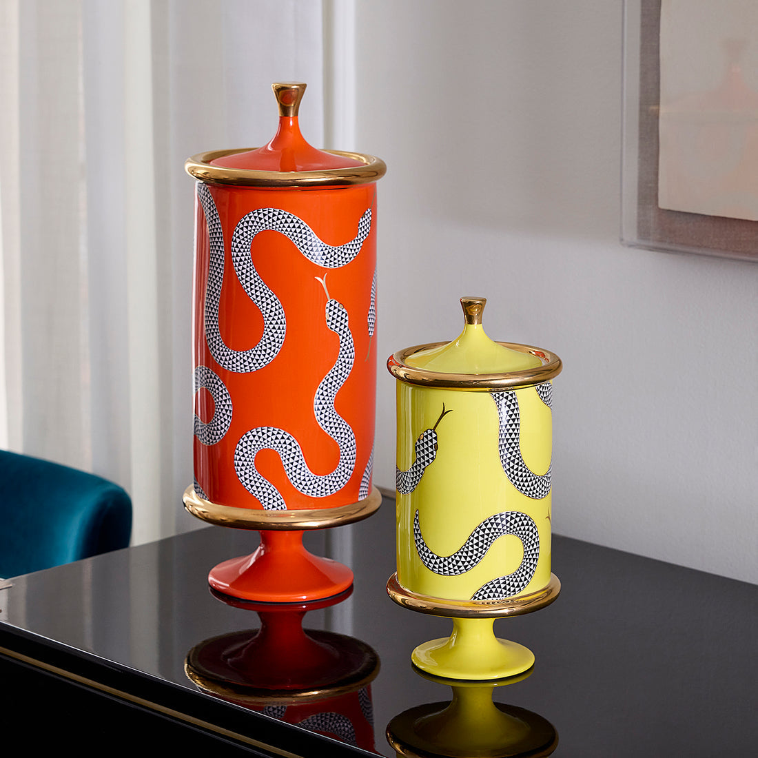 Jonathan Adler Eden Orange Canister accessory with a vibrant orange finish, detailed close-up of the decorative ceramic piece.