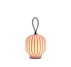 Blue Filigrana Light table lamp by Established and Sons with delicate cane design, displayed on a white background.