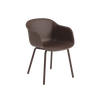 Fiber Outdoor Armchair by Muuto with brown and red woven seat and backrest, modern seating for outdoor spaces.