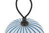 Blue Filigrana Lantern by Established and Sons, a modern decorative table lighting piece with intricate caned design on a white background.
