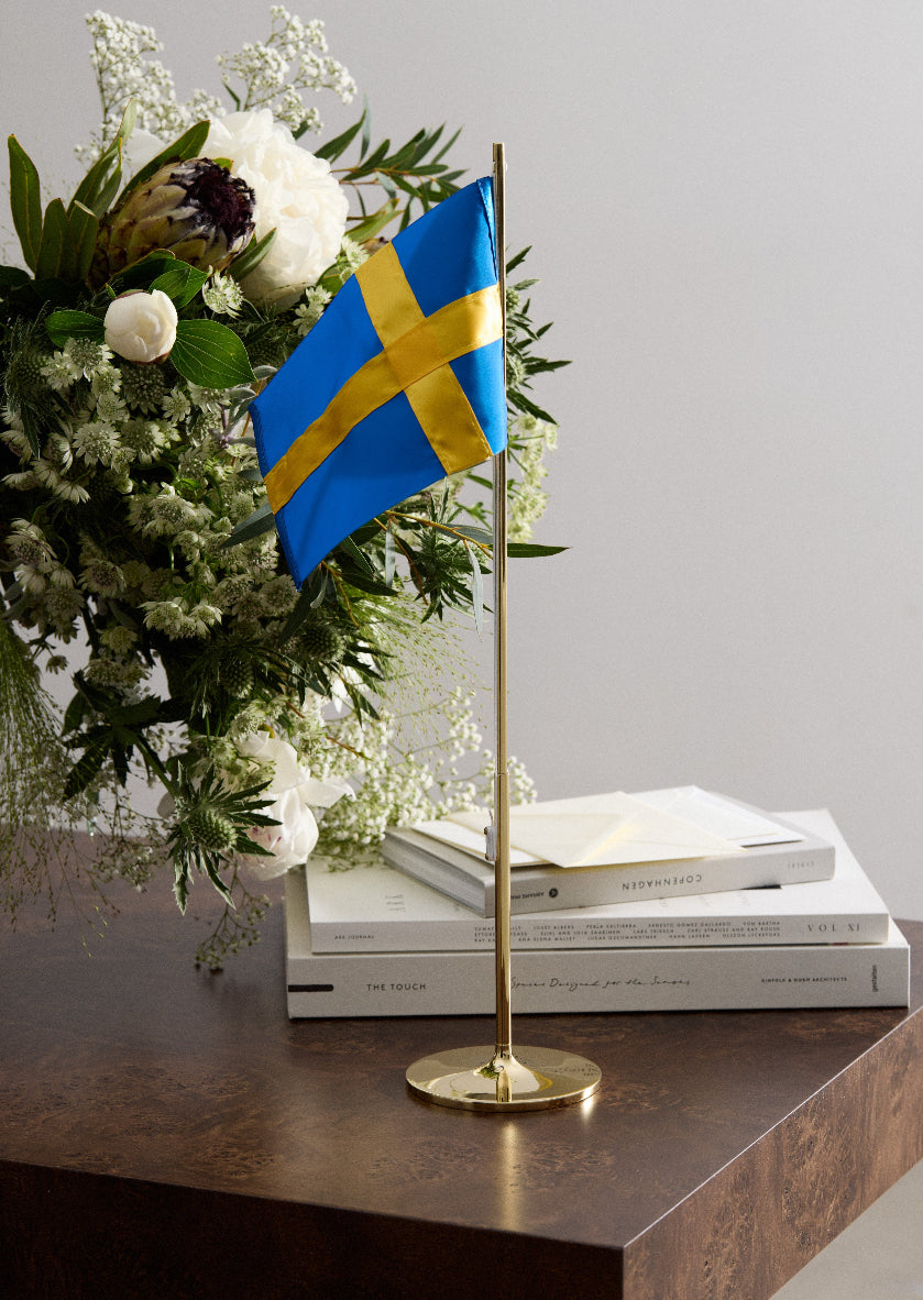 Modern Skultuna Flagpole accessory with sleek design, featuring a minimalist metal flag holder on a sturdy pole.