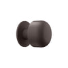 Wall-mounted Flos Bellhop lighting fixture in deep brown, featuring a sleek, modern design for interior illumination.