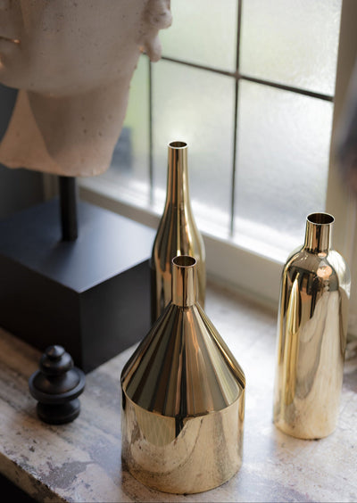 Skultuna Via Fondazza vase with a sleek, modern design in a metallic finish, perfect for elegant home accessories.