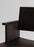Vaarnii Maasto dining armchair with wooden frame and cushioned seat, showcasing modern seating design and natural materials.