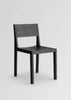 Vaarnii Maasto dining chair with wooden frame and upholstered seat, modern seating with sleek design.